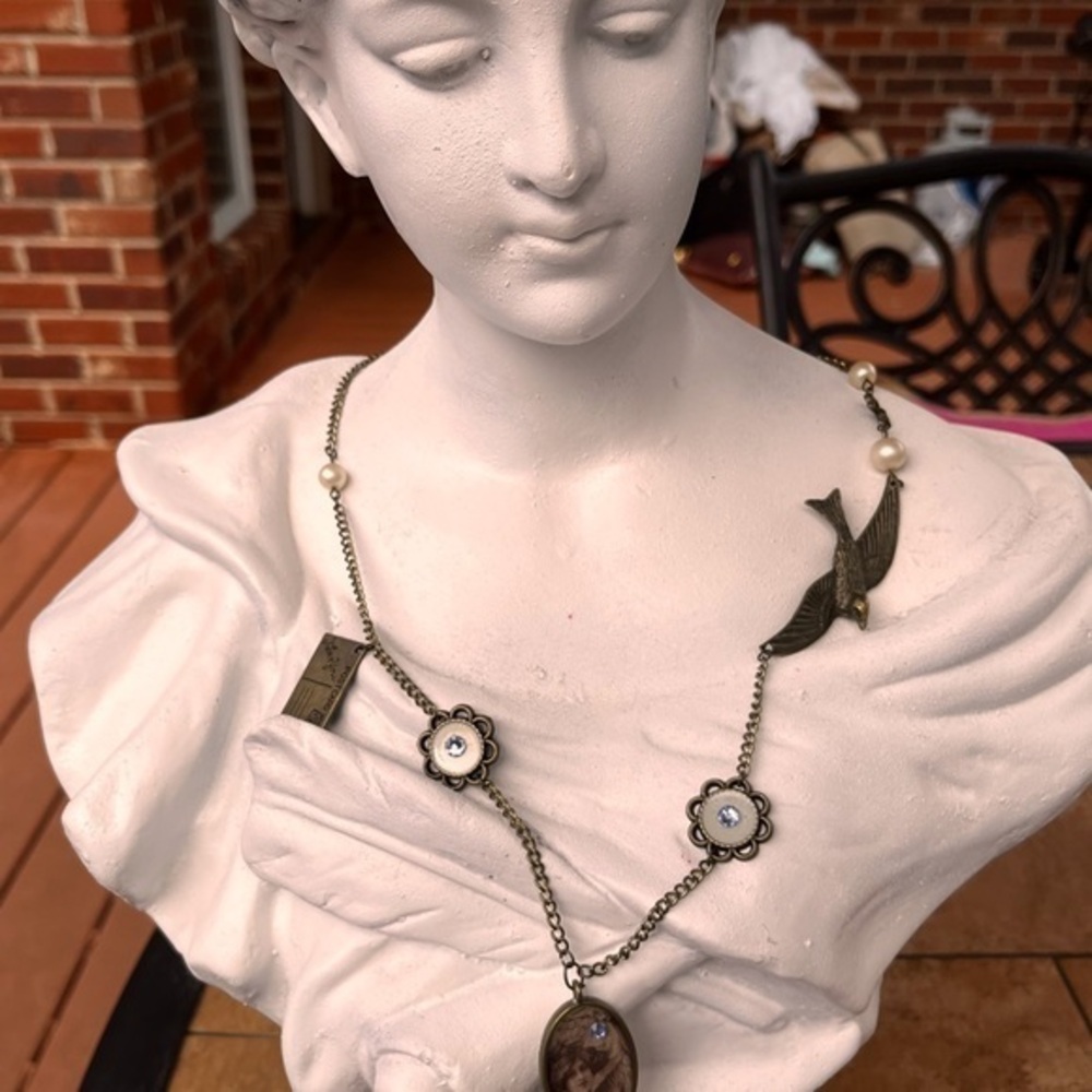 Handmade necklace. Charms. Woman antique portrait in resin